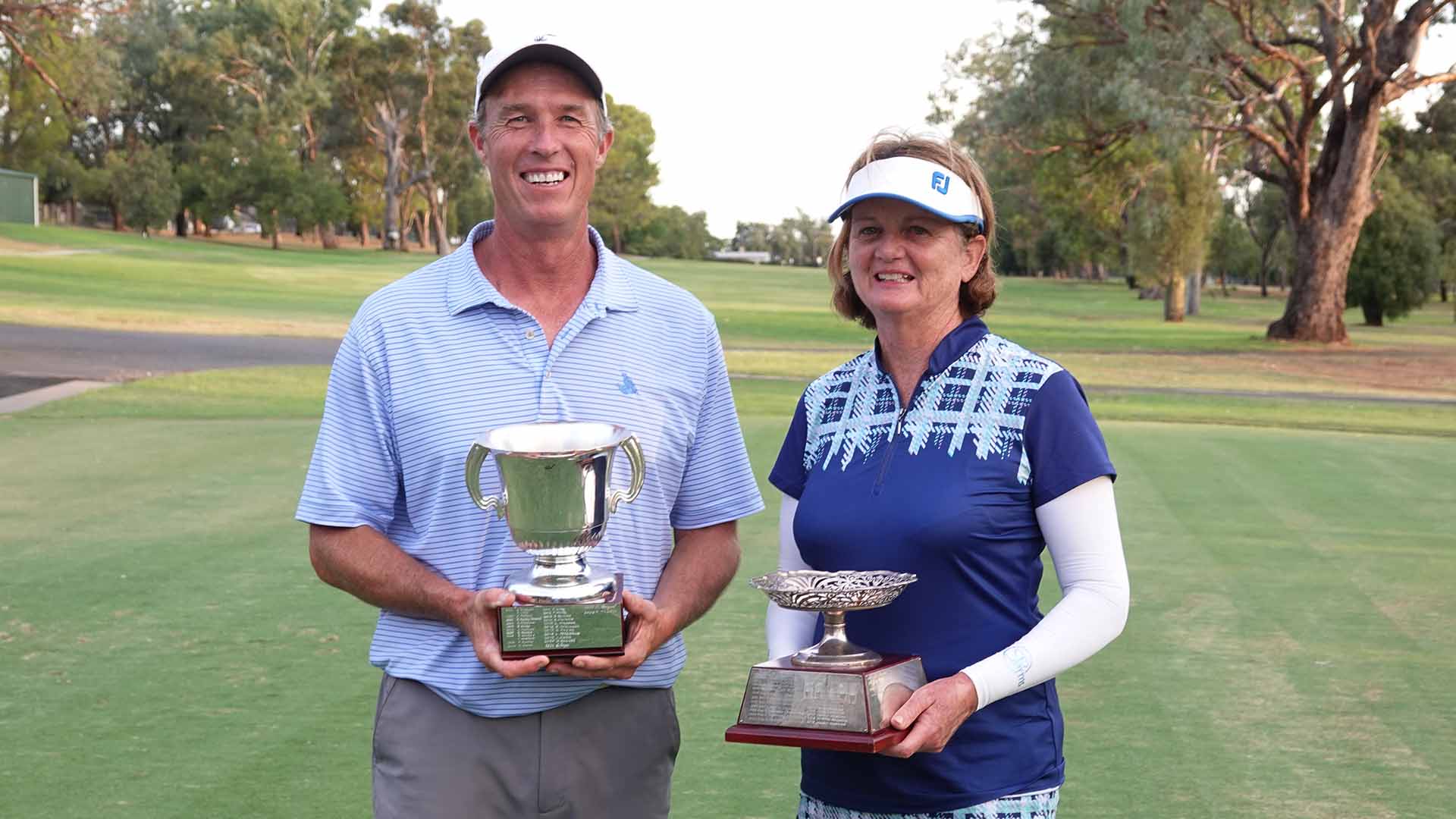 andrew Tharle and Louis Mullard with the winners trophies