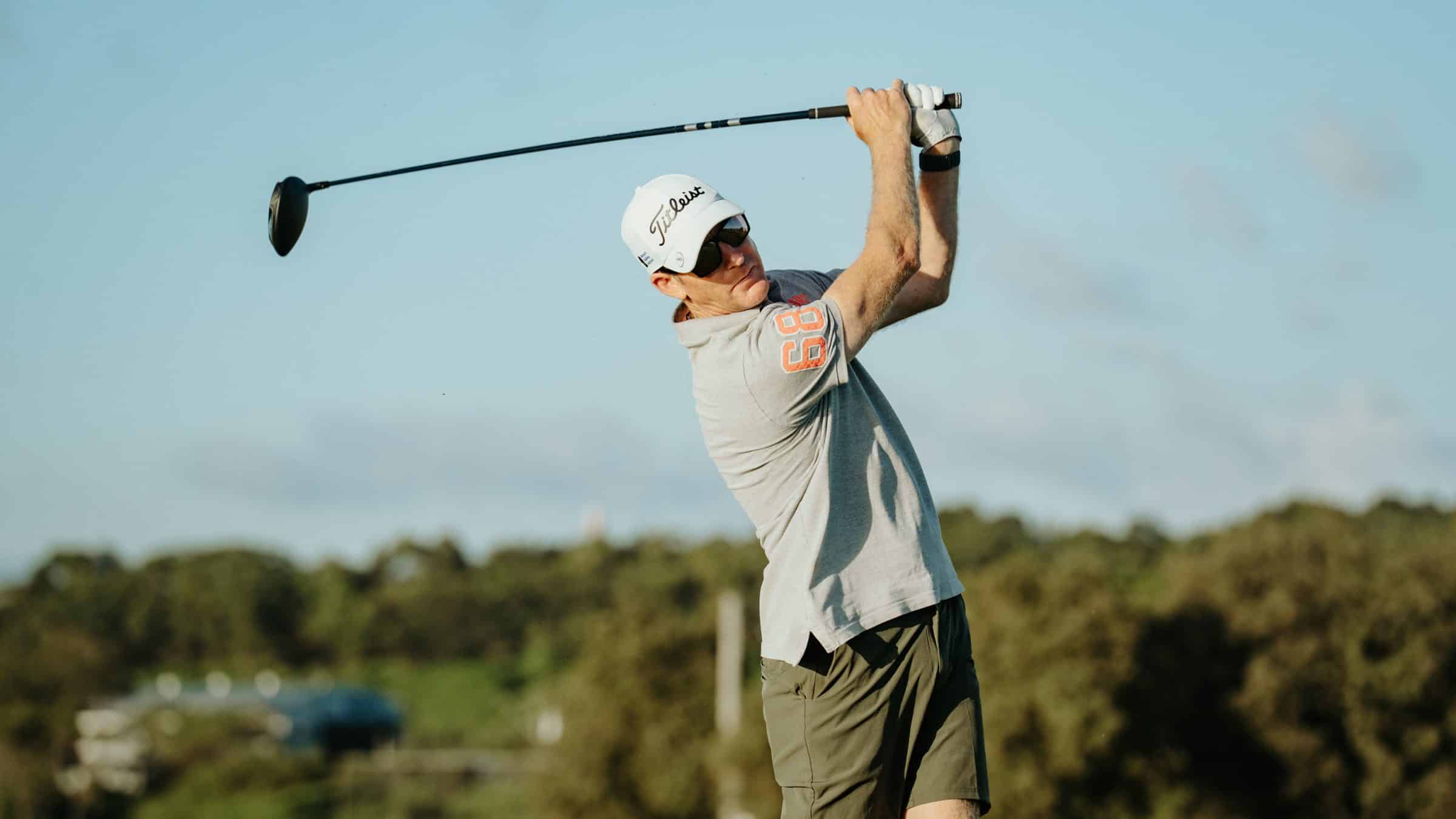 Christopher Campbell hitting a tee shot