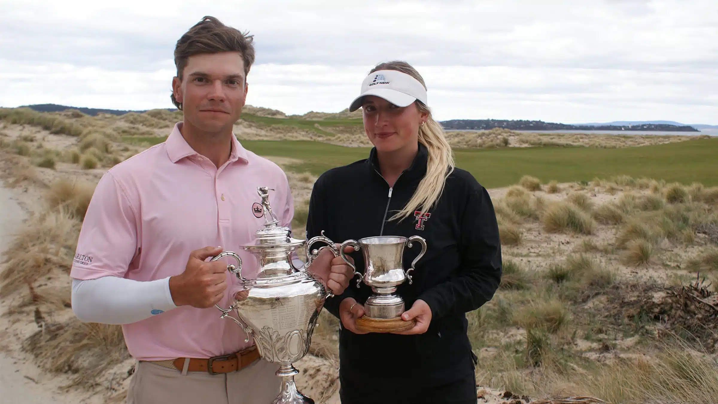 Callum Sharp and Amy Squires posing with their trophies